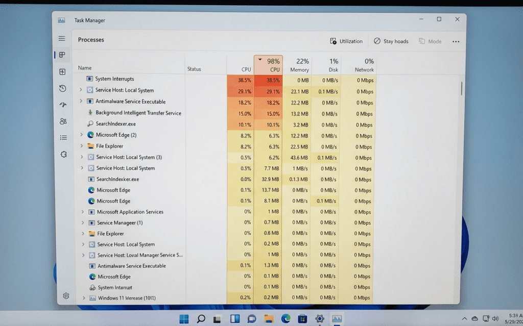 Windows 11 Task Manager showing background processes and high CPU usage contributing to keyboard input delay